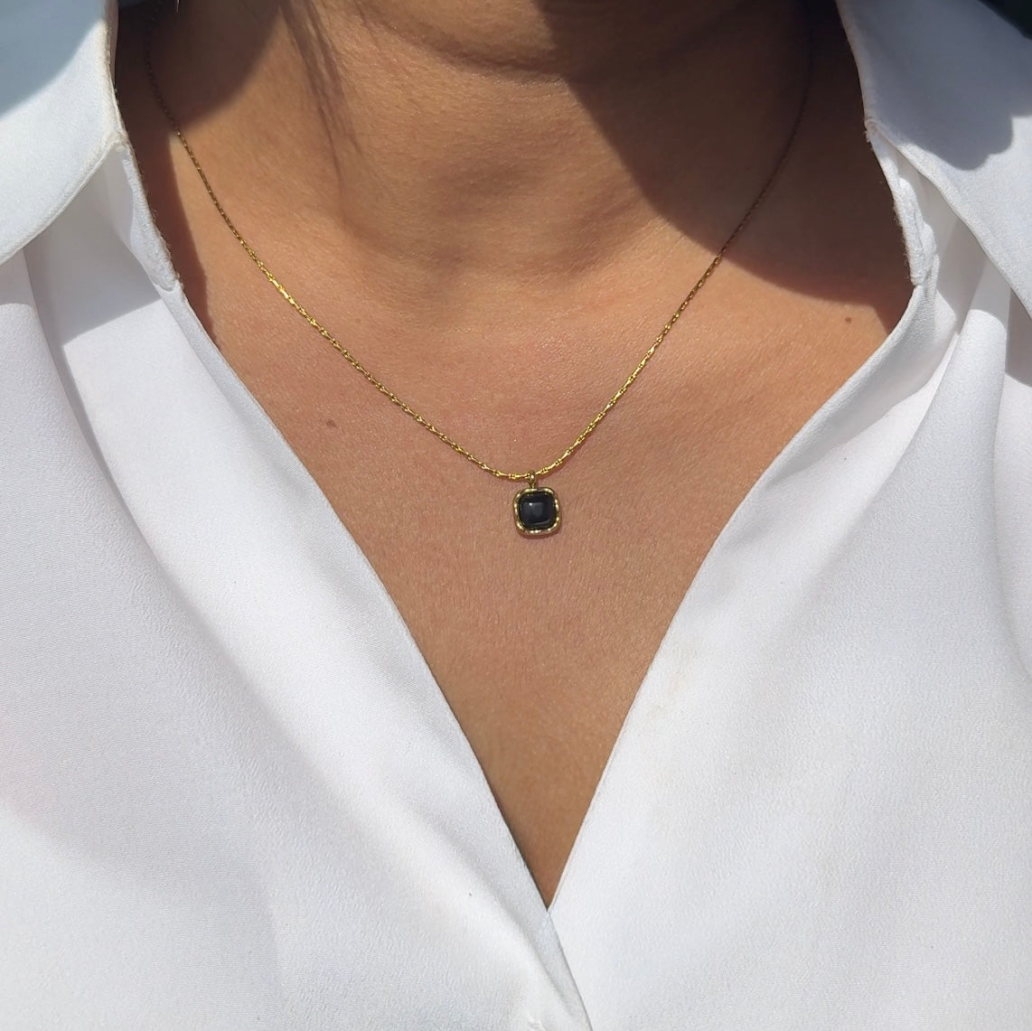 Black charm necklace